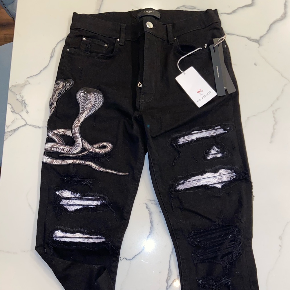 NWT Black distressed snake patch jeans